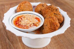 Croquetas de merluza y calabacines al horno