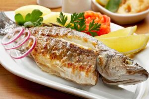 Lubina con patatas al horno
